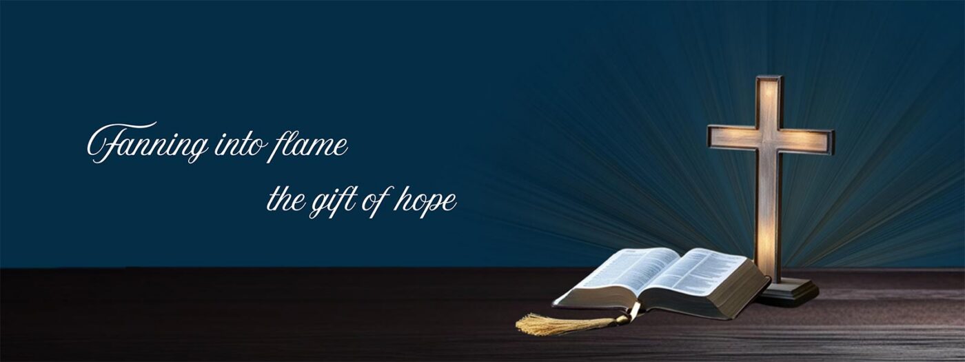 Banner image of a table with Bible and Cross with the caption of "Fanning into flame the gift of hope"